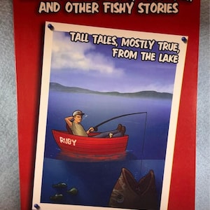 May include: A book cover with a red border features the title "RUBY THE ROWBOAT, STINKBAIT, AND OTHER FISHY STORIES." The cover art depicts a man fishing from a red rowboat on a lake. The text "TALL TALES, MOSTLY TRUE, FROM THE LAKE" is also visible.