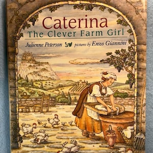 May include: A children's book cover titled "Caterina The Clever Farm Girl" with illustrations of a farm scene. The cover features a woman working, chickens, and a landscape with a castle. The book is by Julienne Peterson, with pictures by Enzo Giannini.