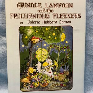 May include: A vintage children's book titled "Grindle Lamfoon and the Procurious Fleekers" by Valerie Hubbard Damon. The cover features a whimsical illustration of a goose playing a trumpet, surrounded by fantastical creatures and a night scene.