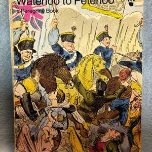 May include: A vintage book cover titled "Waterloo to Peterloo" by R.J. White. The cover features an illustration of a historical battle scene with soldiers on horseback, flags, and figures in period clothing. The color palette includes blues, yellows, and browns.