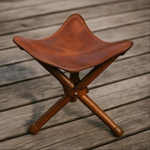 Handmade Folding Calfskin Stool – Durable Leather Seat, Hornbeam Wood Legs, Portable Chair