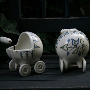 Handmade porcelain baby carriage