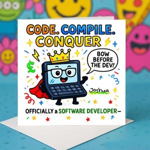 May include: A greeting card featuring a cartoon laptop with a crown and cape. The card displays the text "CODE. COMPILE. CONQUER" and "OFFICIALLY a SOFTWARE DEVELOPER." A speech bubble says "BOW BEFORE THE DEV!" with the name "Joshua".