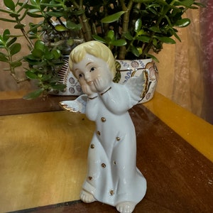 Italian porcelain figurine of an angel hand painted 13 cm