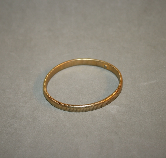 Costume jewelery bracelet, in golden metal, snake… - image 1