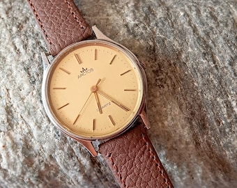 Reloj de cuarzo Arctos vintage, reloj de pulsera para hombre de los años 80, en funcionamiento.