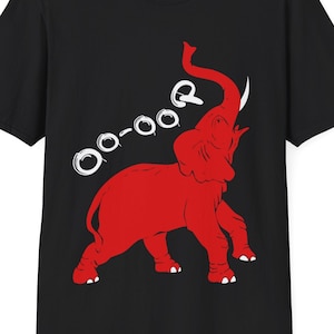 May include: Black t-shirt with a red elephant design and the white text "oo-oo-r". The elephant is shown with its trunk up and tusks. A casual, unisex tee.