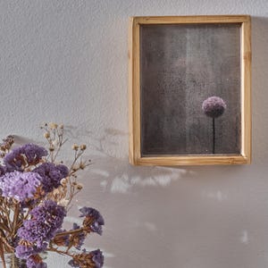 UnoDiUno, stampa fotografica su carta antica inserita in scatola di bambù e resinata.