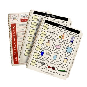 May include: Three spiral bound books with colorful illustrations and text. The books are titled "Let's Talk About", "Big Caregiver No", "Meal Time", and "Bathing".