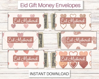 Puede incluir: Seis sobres imprimibles para regalar dinero con un diseño de corazón de purpurina dorada rosa. Los sobres muestran el texto "Eid Mubarak" en una fuente cursiva.