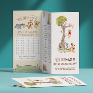 May include: A folded birthday card featuring Winnie the Pooh characters. The card includes a word search puzzle, a maze, and illustrations of Pooh, Tigger, Piglet, and Eeyore. The text reads "Thomas 2nd Birthday."