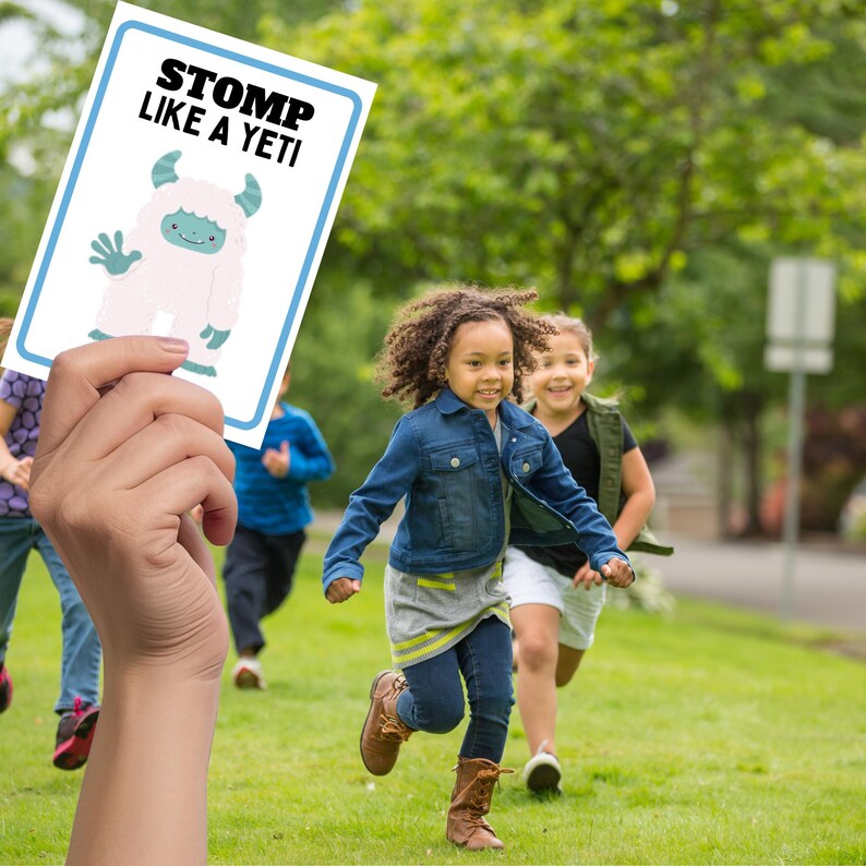 kids running with teacher holding card with stomp like a yeti.