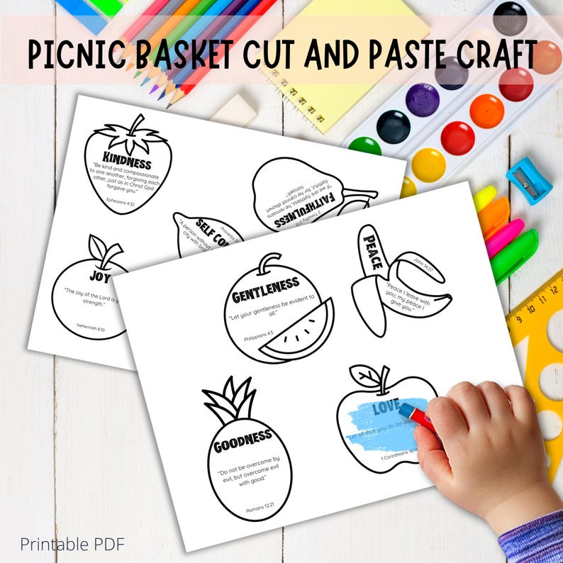white table with arts and crafts supplies on it. Says Picnic Basket cut and paste craft, printable pdf in the corner. shows a hand coloring the love apple for sunday school.