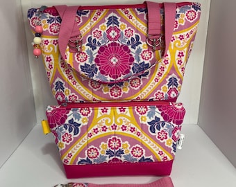 Floral top strap quilted bag with matching large fat bottom wristlet