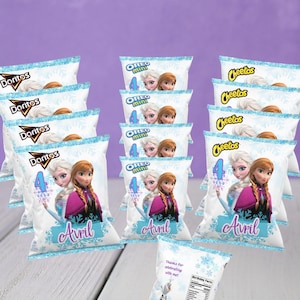 May include: A collection of snack bags featuring characters from the movie "Frozen." The bags include Doritos, Oreo Mini, and Cheetos. Each bag has a "4" and the name "Avril" on it. One bag has the text "Thanks for celebrating with me!"