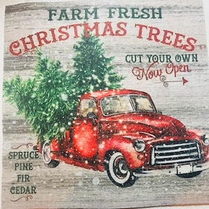 May include: A red vintage pickup truck with a Christmas tree in the back. The truck is on a wooden background with the text "Farm Fresh Christmas Trees Cut Your Own Now Open" and a list of tree types: Spruce, Pine, Fir, Cedar.