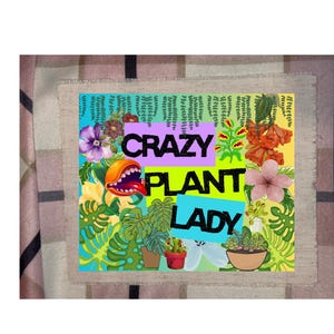 May include: A colorful illustration with the text "CRAZY PLANT LADY" surrounded by various plants and flowers. The design includes a cartoonish monster with an open mouth, potted plants, and a variety of floral elements, all set against a textured background.