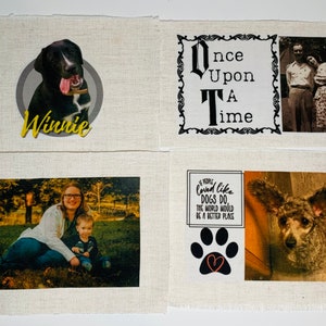 May include: Four fabric squares with different images printed on them. The top left square has a black dog with the name Winnie printed below. The top right square has a black and white image of a couple with the text "Once Upon A Time" printed above. The bottom left square has a photo of a woman and a child in a park. The bottom right square has a photo of a dog with the text "If people loved like dogs do, the world would be a better place" printed above the image.