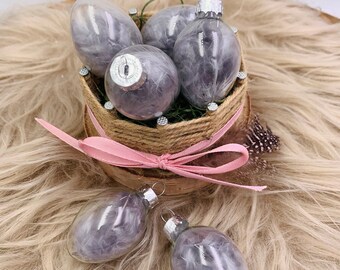 Set of Easter eggs, spring ball, oval, feathers, glass, Easter bunny