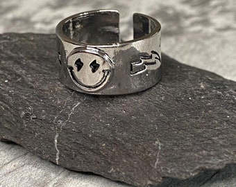 Smiley face lightning bolt ring deals