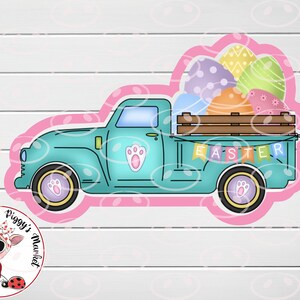 May include: A teal blue vintage pickup truck with a wooden bed filled with colorful Easter eggs. The truck has a banner that says "EASTER" and paw print details on the sides.