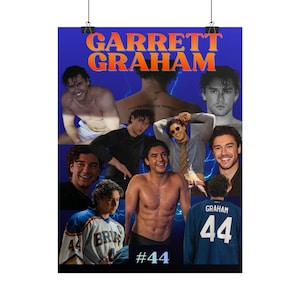 May include: A poster with a blue background featuring multiple images of a person. The poster has the name "GARRETT GRAHAM" in orange letters at the top. The number "44" is visible on a jersey. The poster is held by two black clips.