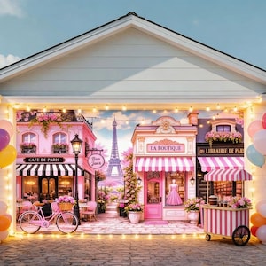 May include: A whimsical mural of a Parisian street scene, featuring pink buildings, a bicycle, and the Eiffel Tower. The scene includes a cafe, boutique, and bookstore, all adorned with flowers and string lights. Balloons frame the scene.