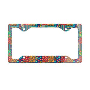 May include: A colorful license plate frame with a patchwork design featuring red, yellow, blue, and green squares and flowers.