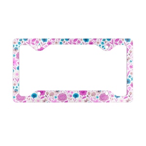 Elegante marco de matrícula metálico con diseño floral, accesorio único para coche, acabado brillante, decoración elegante para vehículos, estilo flower power.