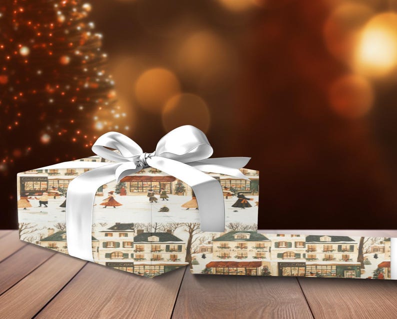 a present box with a white bow on a wooden table
