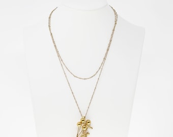 Lange vintage bedelketting met aapbedel, herwerkte ketting, hergebruikte sieraden, assemblage sieradencollage, bewerkt vintage