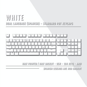 May include: White keyboard keycaps with Spanish and English lettering. The keycaps are half printed and half backlit. The keycaps are ANSI standard and have 104 keys. The Spanish legends are not backlit.