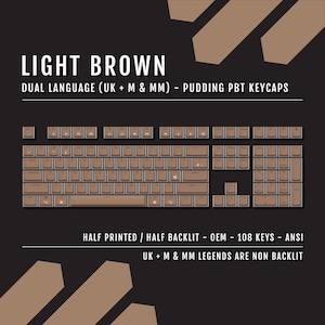 May include: Light brown pudding PBT keycaps for a keyboard. The keycaps are dual language (UK + M & MM), half printed, and half backlit. The set includes 108 keys and is ANSI standard. The UK + M & MM legends are non-backlit.
