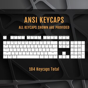 May include: A white keyboard with 104 keycaps, labeled with the standard ANSI layout. The text "ANSI KEYCAPS" and "ALL KEYCAPS SHOWN ARE PROVIDED" is displayed above the keyboard. The text "104 Keycaps Total" is displayed below the keyboard.