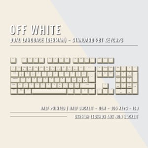 Könnte beinhalten: Tastenkappen in Off-White mit schwarzer Beschriftung. Die Tastenkappen sind für ein Standard-Tastaturlayout mit 105 Tasten und einer ISO-Eingabetaste. Die Tastenkappen sind halb bedruckt und halb beleuchtet. Die deutschen Legenden sind nicht beleuchtet.