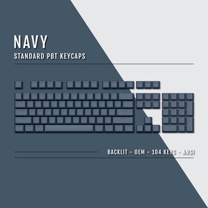 May include: Navy blue standard PBT keycaps for a keyboard. The image shows a full set of 104 keys in a dark blue colour, including the main keyboard layout and the numeric keypad. The text "NAVY" and "BACKLIT - OEM - 104 KEYS - ANSI" are also visible.