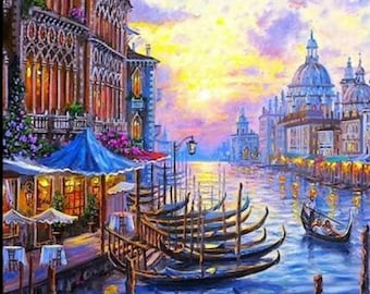 May include: A painting of a canal in Venice, Italy. The canal is lined with buildings, some of which have gondolas docked at their bases. The water is a deep blue, and the sky is a light blue with white clouds. The buildings are a mix of yellow, orange, and red.