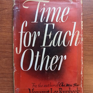 May include: Vintage book cover with the title "Time for Each Other" in white script over a red and black background. The author's name, Margaret Lee Runbeck, is printed in black at the bottom. The cover shows signs of wear.
