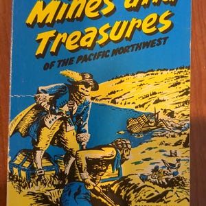 May include: Vintage book cover titled "Lost Mines and Treasures of the Pacific Northwest." The cover features an illustration of two figures in period clothing near a treasure chest and a boat, set against a blue background.