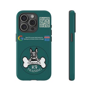 May include: Teal phone case featuring a German Shepherd dog graphic with the text "OAKHAUS K9 TRAINING" on a bone. The case also includes a Google logo and a QR code. The side view of the case is also teal.