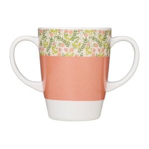 May include: A white ceramic mug with two handles, featuring a floral pattern in shades of green, pink, and white. The mug has a peach-colored bottom half with a dotted pattern.