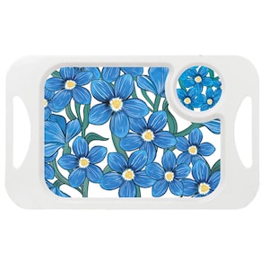 May include: A white rectangular lap tray with a floral design. The tray features a pattern of blue flowers with yellow centers and green stems on a white background. It has two handles and a circular inset for a cup.