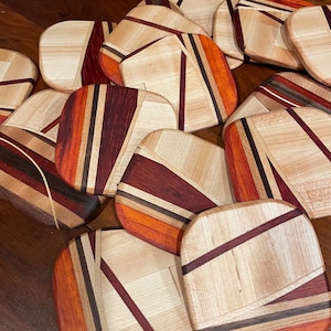Hardwood drink coasters in made from mix of domestic &exotic woods. Every coaster is unique.