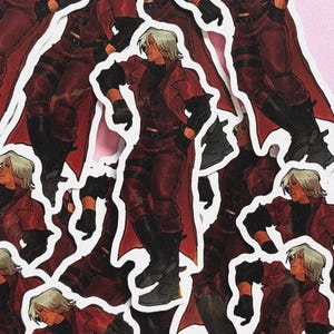 Peut inclure: Plusieurs autocollants représentant un personnage en manteau, pantalon et bottes rouges. Le personnage a les cheveux blancs et est dans une pose dynamique. Les autocollants sont sur un fond rose.