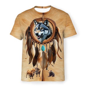 May include: A brown t-shirt featuring a wolf's head within a dreamcatcher adorned with feathers and a turquoise stone. The background is a brown fur pattern. Three brown bison and a brown bear are depicted at the bottom of the shirt.