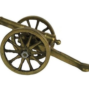 Vintage brass cannon Book Shelf, desktop