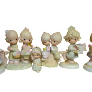 Six Precious Moments Figurines in Original Boxes.