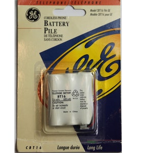 May include: A GE cordless phone battery pile in a white, blue, and yellow package. The battery is labelled BT16, 3.6 volts, and 600 mAh. The package also has the text "Long Life".