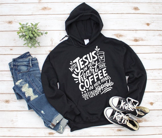 With Jesus in her Heart and coffee in her hand She is unstoppable T-shirt, sweater, Hoodie  Christian Gift, Christian shirt, Religious Shirt