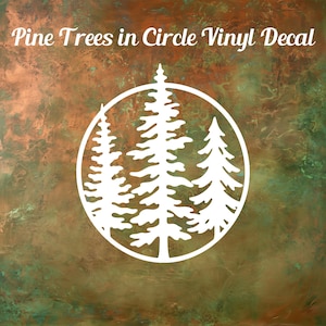 May include: A white vinyl decal featuring a circular frame containing three pine trees of varying heights. The text Pine Trees in Circle Vinyl Decal is printed in white script at the top of the image against a mottled copper and green background.